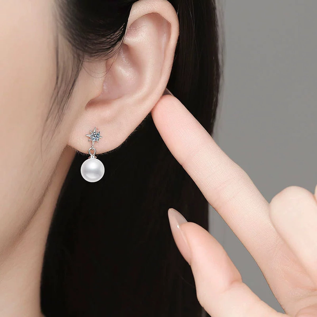 Star Pearl Moissanite Drop Earrings in White Gold-Plated S925 Sterling Silver worn on ear by model