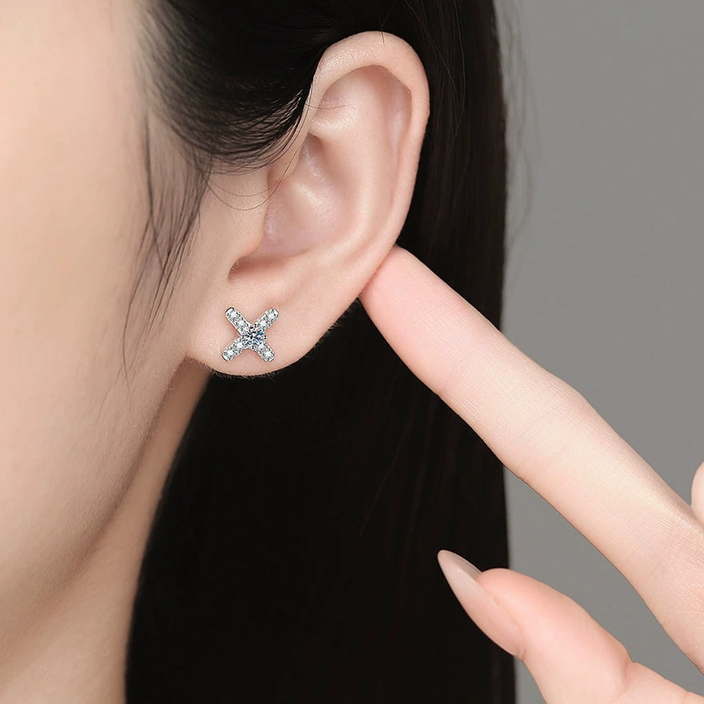 Cross Moissanite Stud Earrings with CZ in White Gold-Plated S925 Sterling Silver worn on ear by model