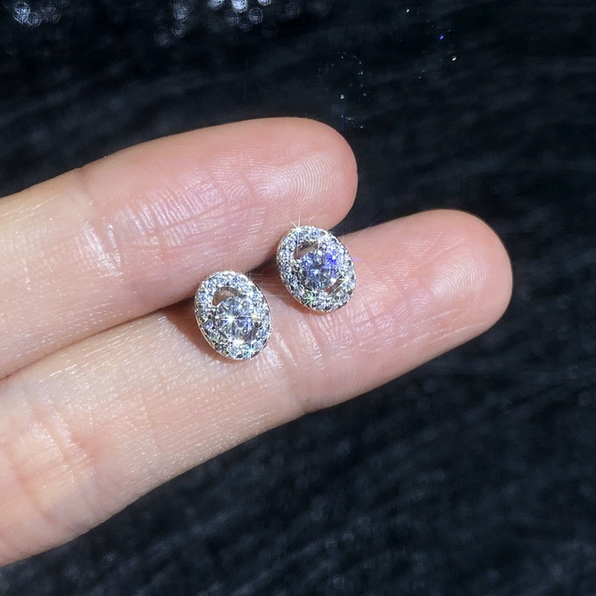 Oval Halo Moissanite Stud Earrings with CZ in White Gold-Plated S925 Sterling Silver close-up product detail view