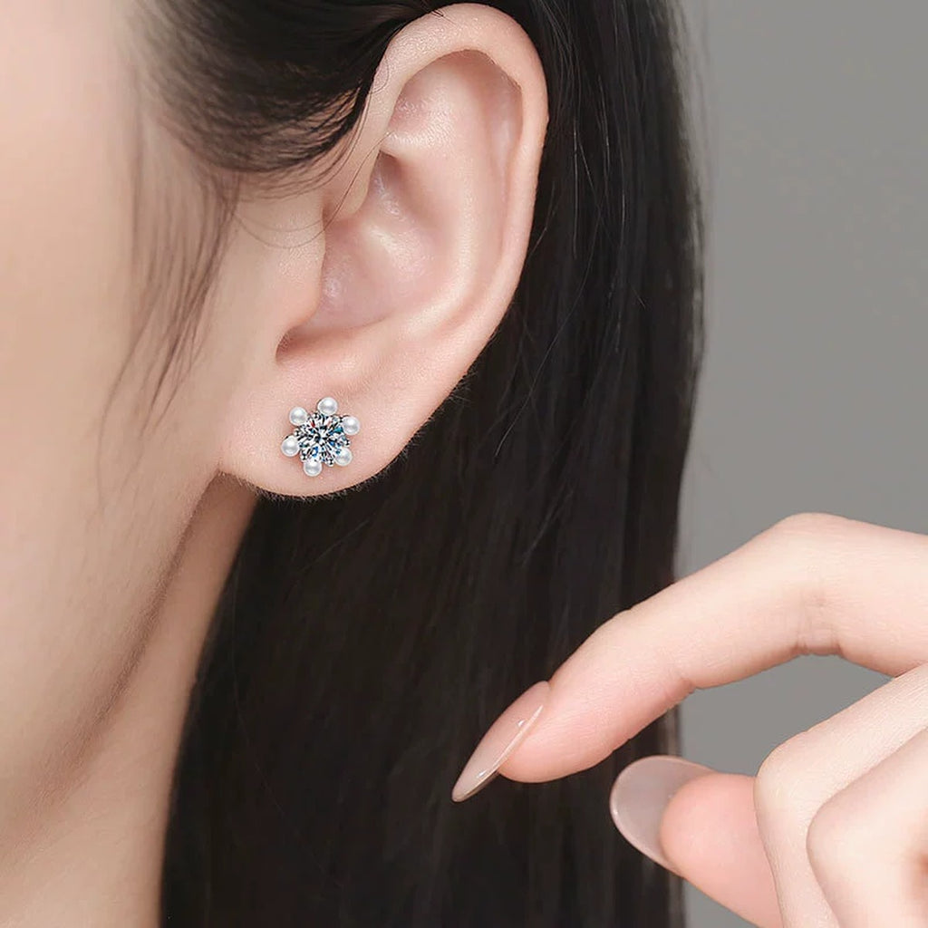 Pearl Flower Moissanite Stud Earrings with CZ in White Gold-Plated S925 Sterling Silver worn on ear by model