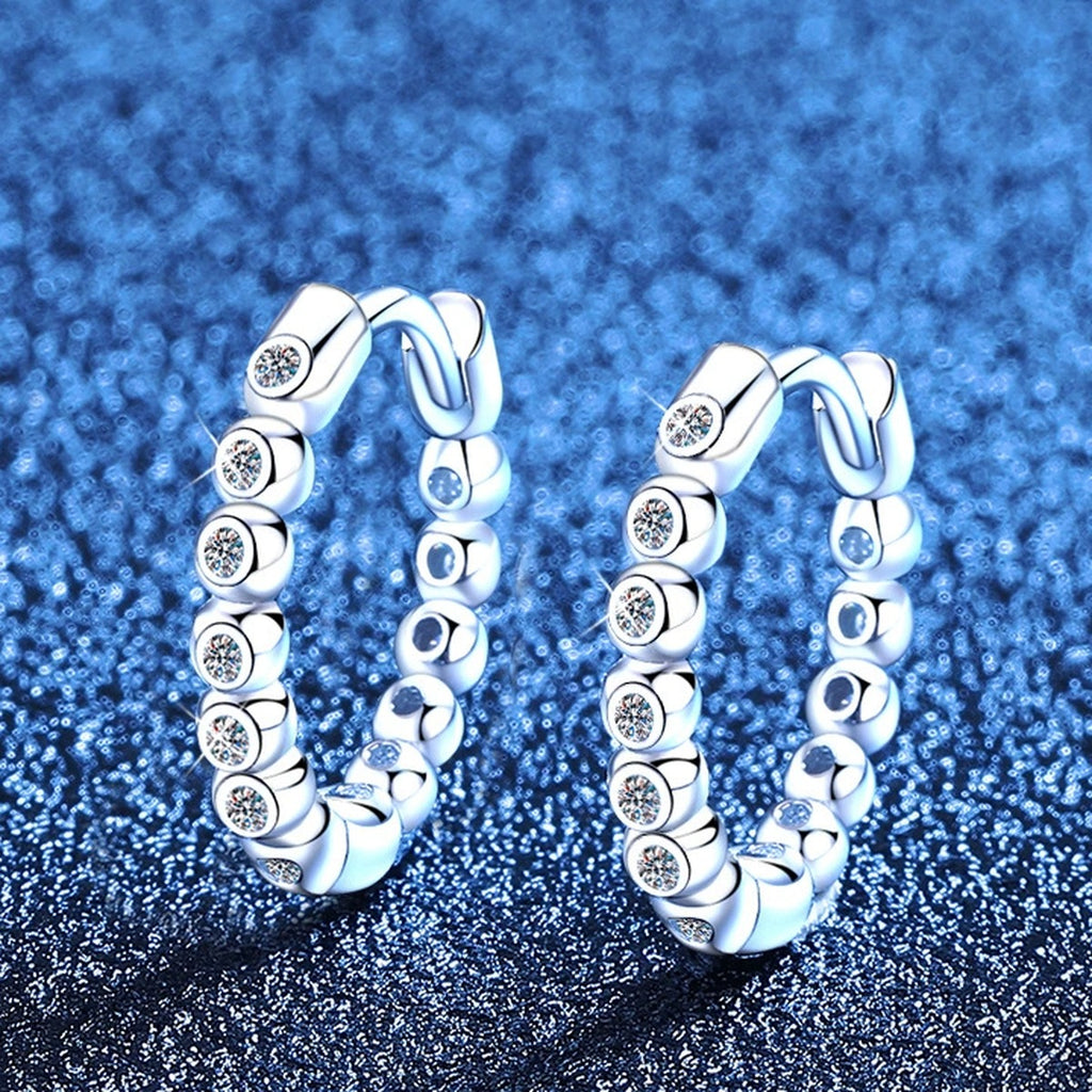Beaded Moissanite Hoop Earrings in White Gold-Plated S925 Sterling Silver blue scene angled view