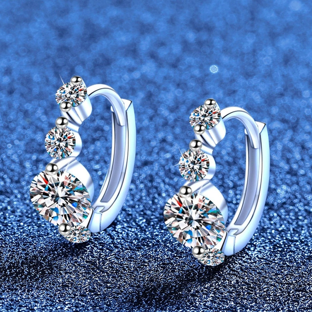 Graduated Moissanite Hoop Earrings in White Gold-Plated S925 Sterling Silver with CZ blue scene angled view