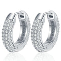 Pave Moissanite Huggie Hoop Earrings in White Gold-Plated S925 Sterling Silver on clean white background showing a compact huggie hoop covered in close-set moissanite sparkle