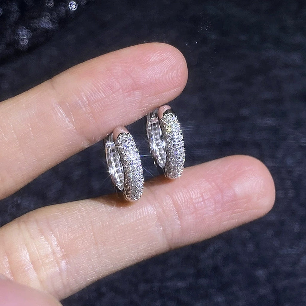 Pave Moissanite Huggie Hoop Earrings in White Gold-Plated S925 Sterling Silver close-up product detail view