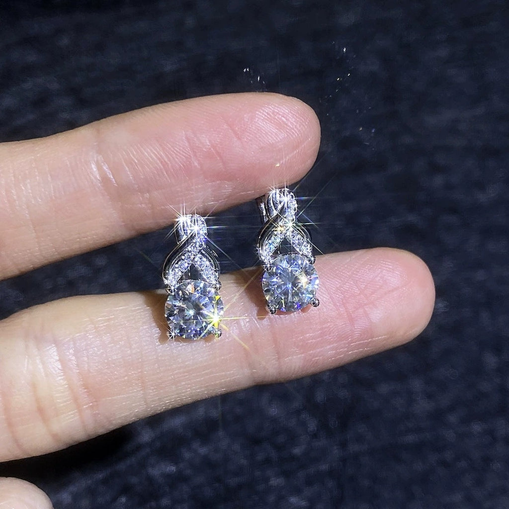 Round Moissanite Huggie Hoop Earrings with CZ in White Gold-Plated S925 Sterling Silver close-up product detail view