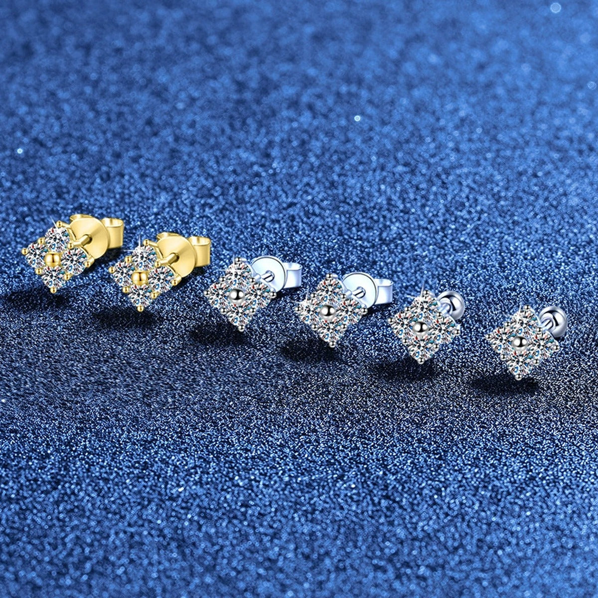 Cushion Moissanite Stud Earrings in Gold-Plated S925 Sterling Silver blue scene close-up view