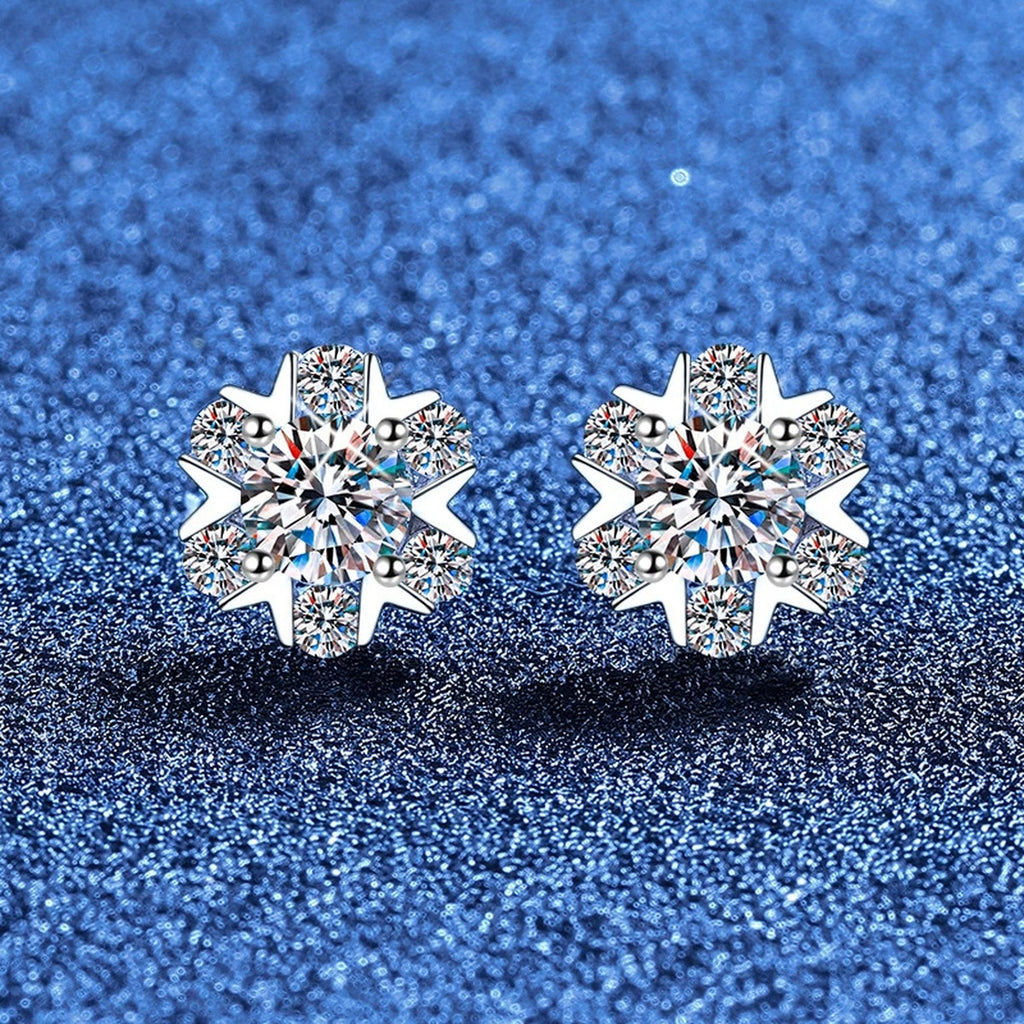 Snowflake Moissanite Stud Earrings with CZ in White Gold-Plated S925 Sterling Silver blue scene angled view