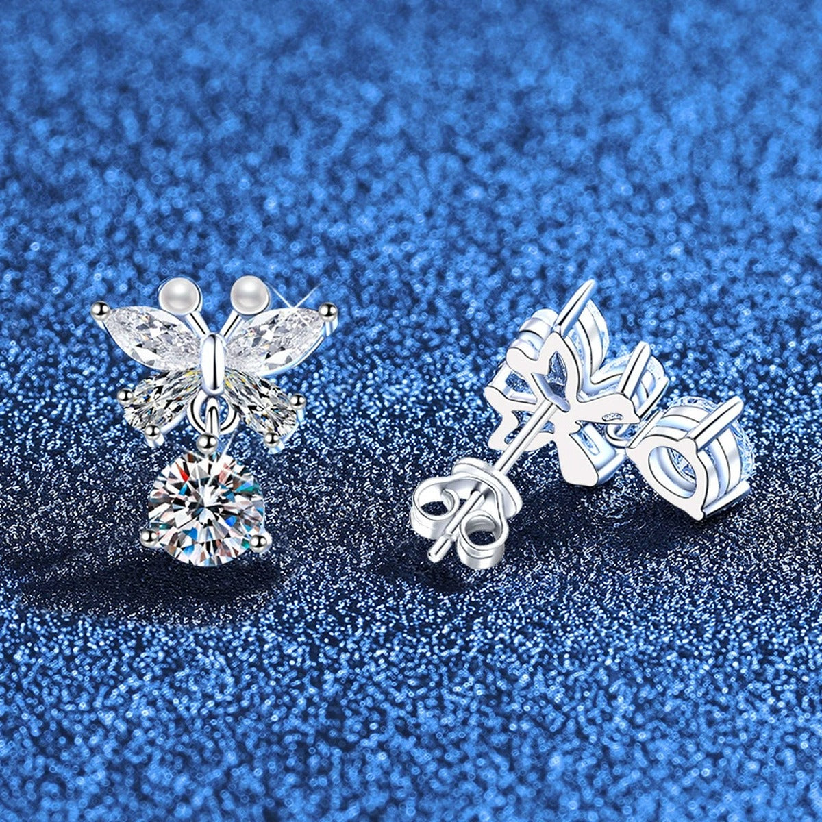 Butterfly Moissanite Stud Drop Earrings with CZ in White Gold-Plated S925 Sterling Silver blue background product view showing front and back details