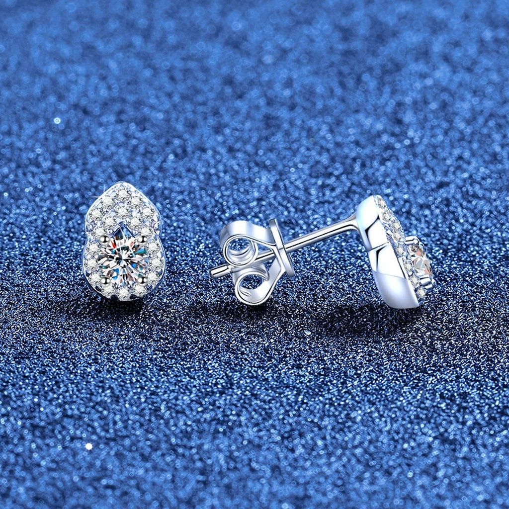 Pear Moissanite Stud Earrings with CZ in White Gold-Plated S925 Sterling Silver blue scene angled view