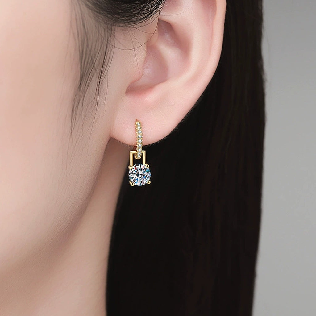Round Moissanite Huggie Hoop Earrings with CZ in Yellow Gold-Plated S925 Sterling Silver worn on ear by model