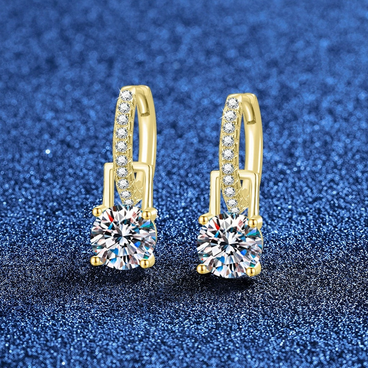 Round Moissanite Huggie Hoop Earrings with CZ in Yellow Gold-Plated S925 Sterling Silver blue scene angled view