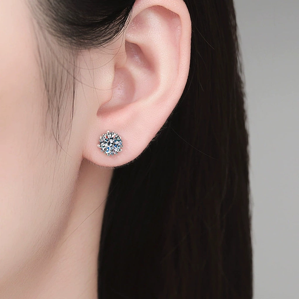 Round Moissanite Stud Earrings in White Gold-Plated S925 Sterling Silver worn on ear by model