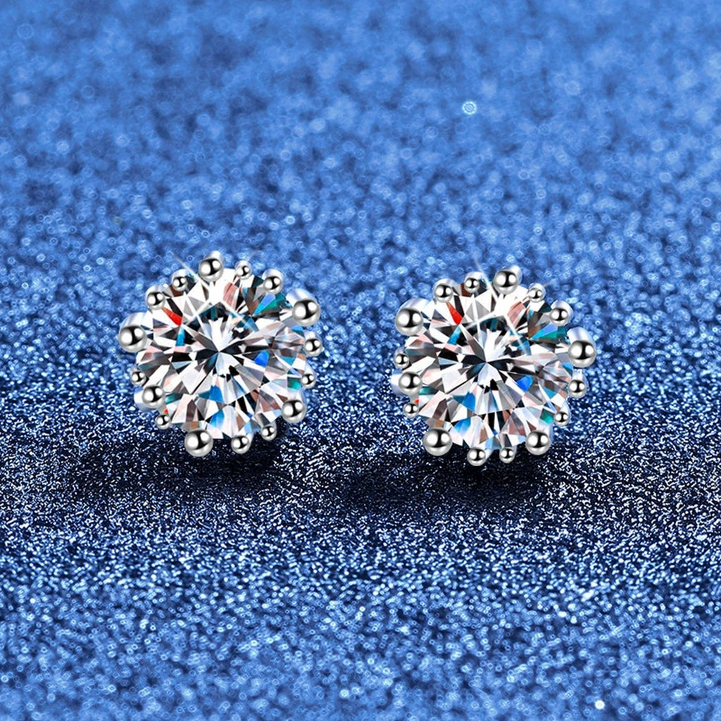 Round Moissanite Stud Earrings in White Gold-Plated S925 Sterling Silver blue scene angled view