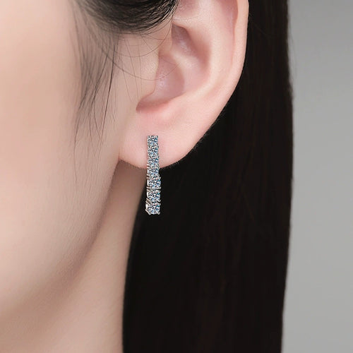 Bar Moissanite Drop Earrings in White Gold-Plated S925 Sterling Silver worn on ear by model