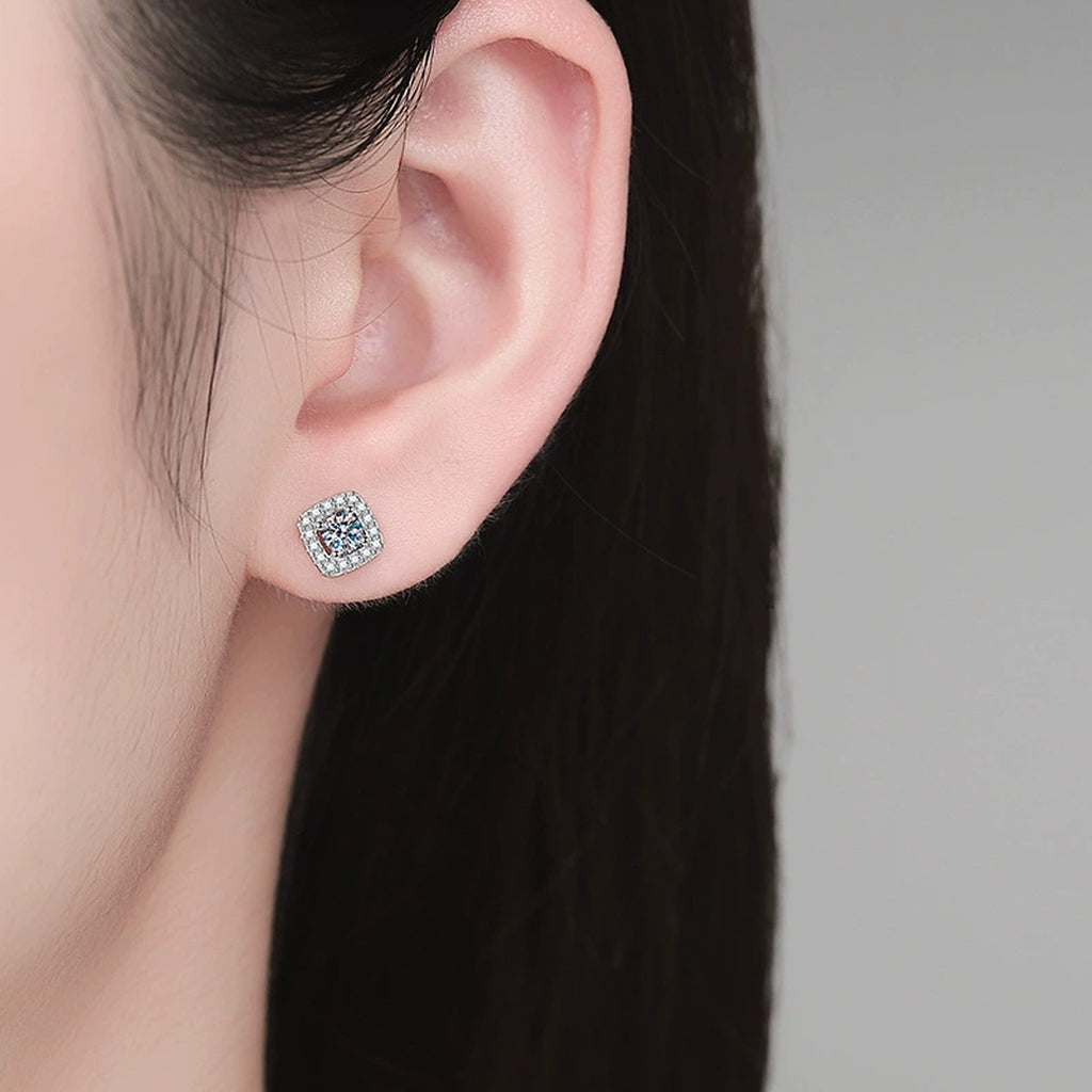 Cushion Halo Moissanite Stud Earrings with CZ in White Gold-Plated S925 Sterling Silver worn on ear by model