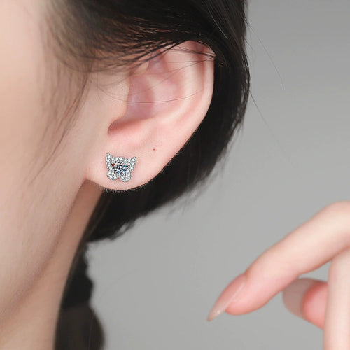 Butterfly Halo Moissanite Stud Earrings in White Gold-Plated S925 Sterling Silver with CZ worn on ear by model