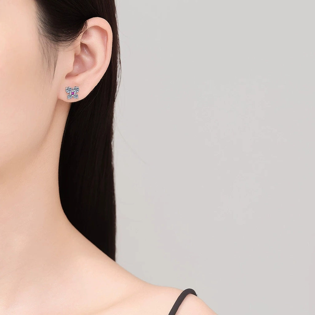 Butterfly Moissanite Stud Earrings with CZ in White Gold-Plated S925 Sterling Silver worn on ear by model