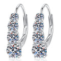 Graduated Moissanite Hoop Earrings in White Gold-Plated S925 Sterling Silver on clean white background showing a hoop earring with graduated round moissanite stones across the front
