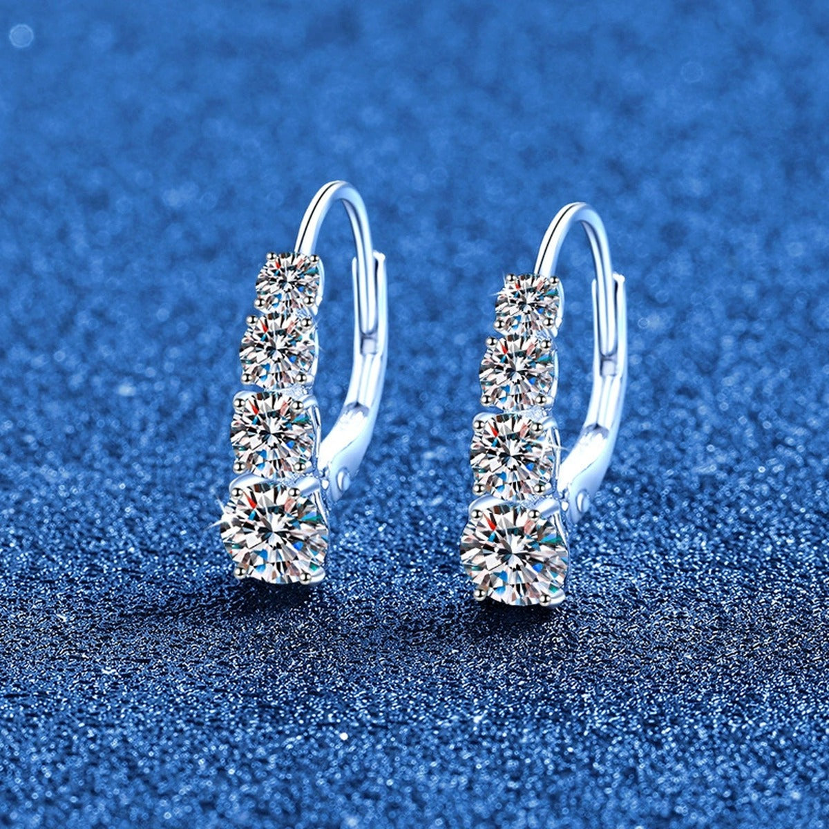 Graduated Moissanite Hoop Earrings in White Gold-Plated S925 Sterling Silver blue scene product view