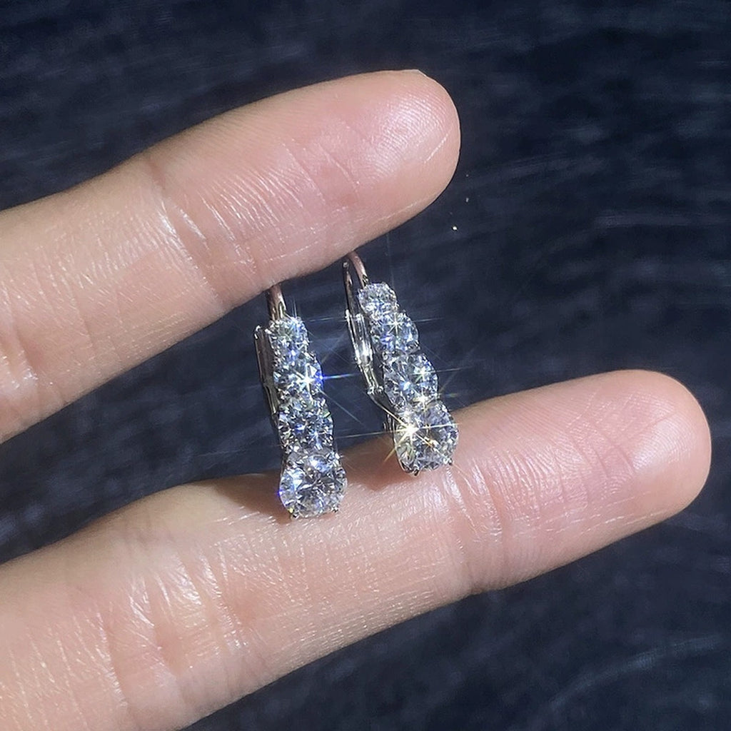 Graduated Moissanite Hoop Earrings in White Gold-Plated S925 Sterling Silver close-up product detail view