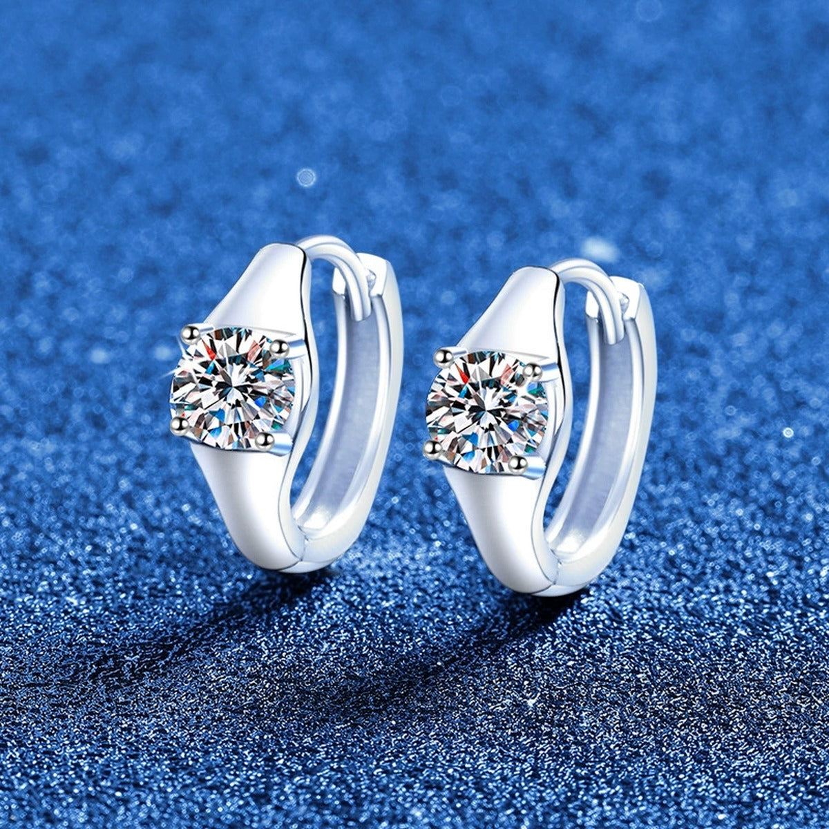 Round Moissanite Huggie Hoop Earrings in White Gold-Plated S925 Sterling Silver blue scene product view