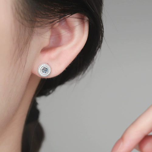 Bezel Moissanite Stud Earrings in White Gold-Plated S925 Sterling Silver worn on ear by model