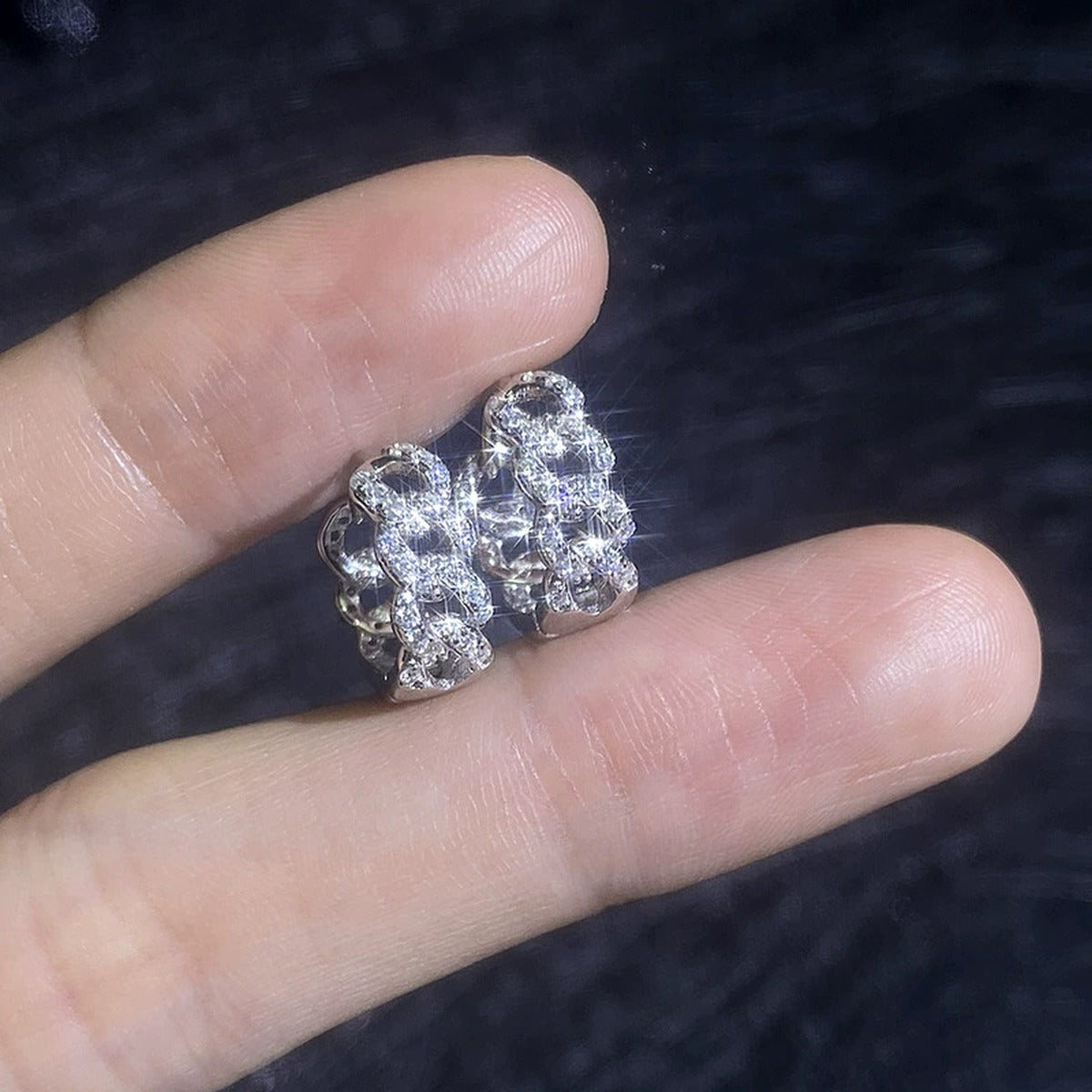 Openwork Pave Moissanite Hoop Earrings in White Gold-Plated S925 Sterling Silver close-up product detail view