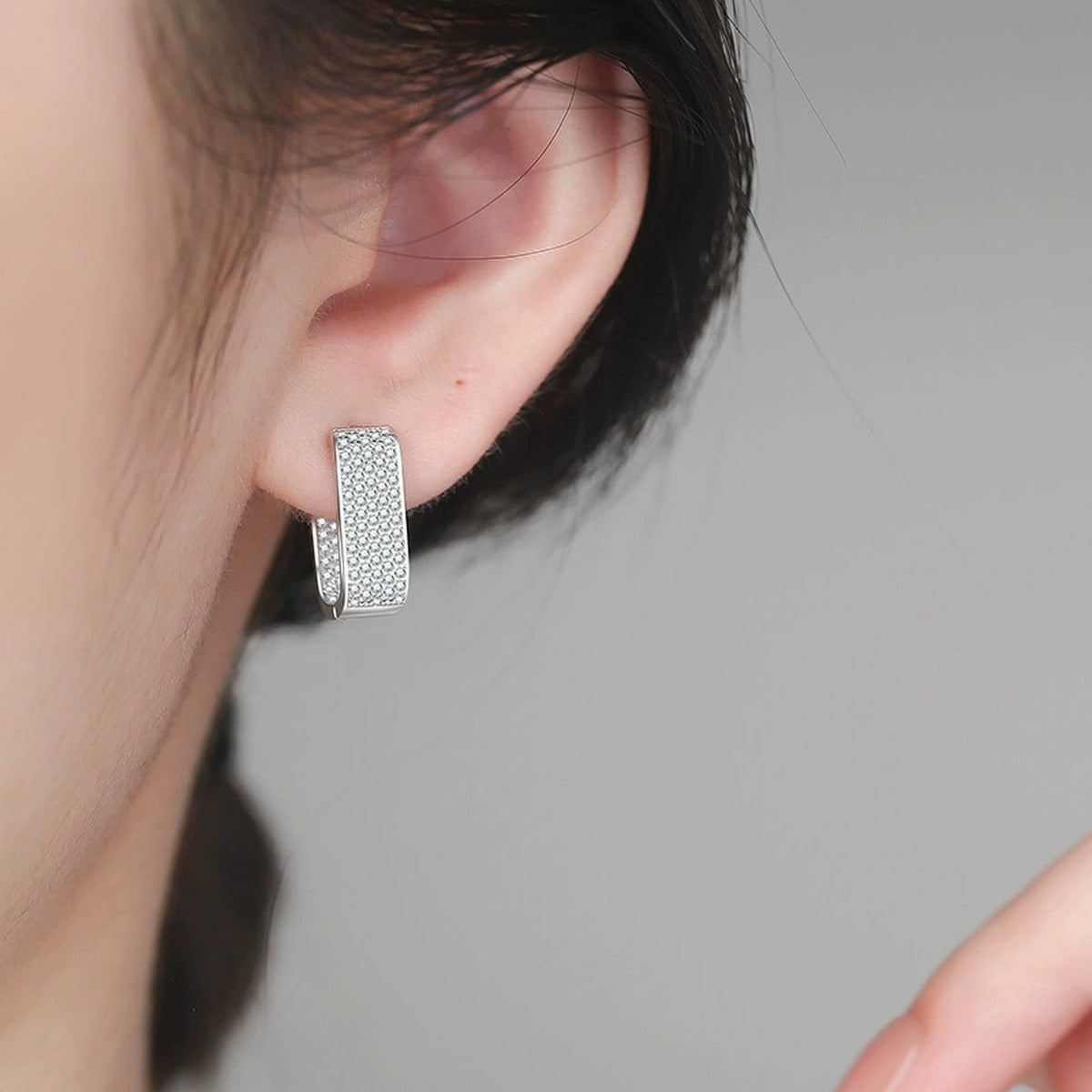 Rectangular Pave Moissanite Hoop Earrings in White Gold-Plated S925 Sterling Silver worn on ear by model