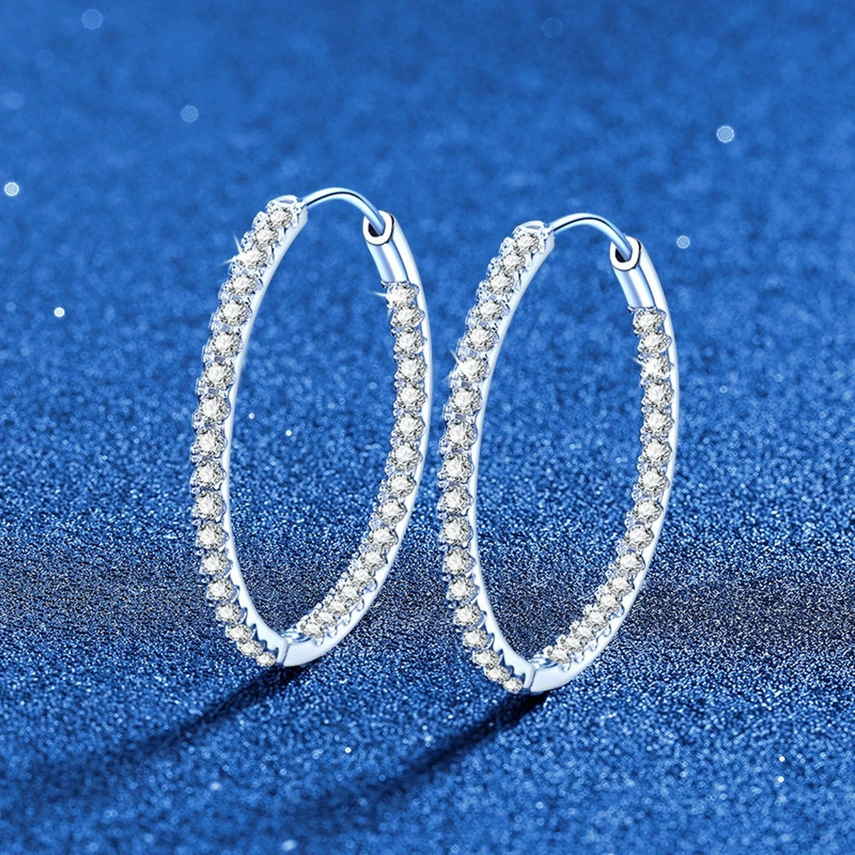 Large Pave Moissanite Hoop Earrings in White Gold-Plated S925 Sterling Silver blue scene product view