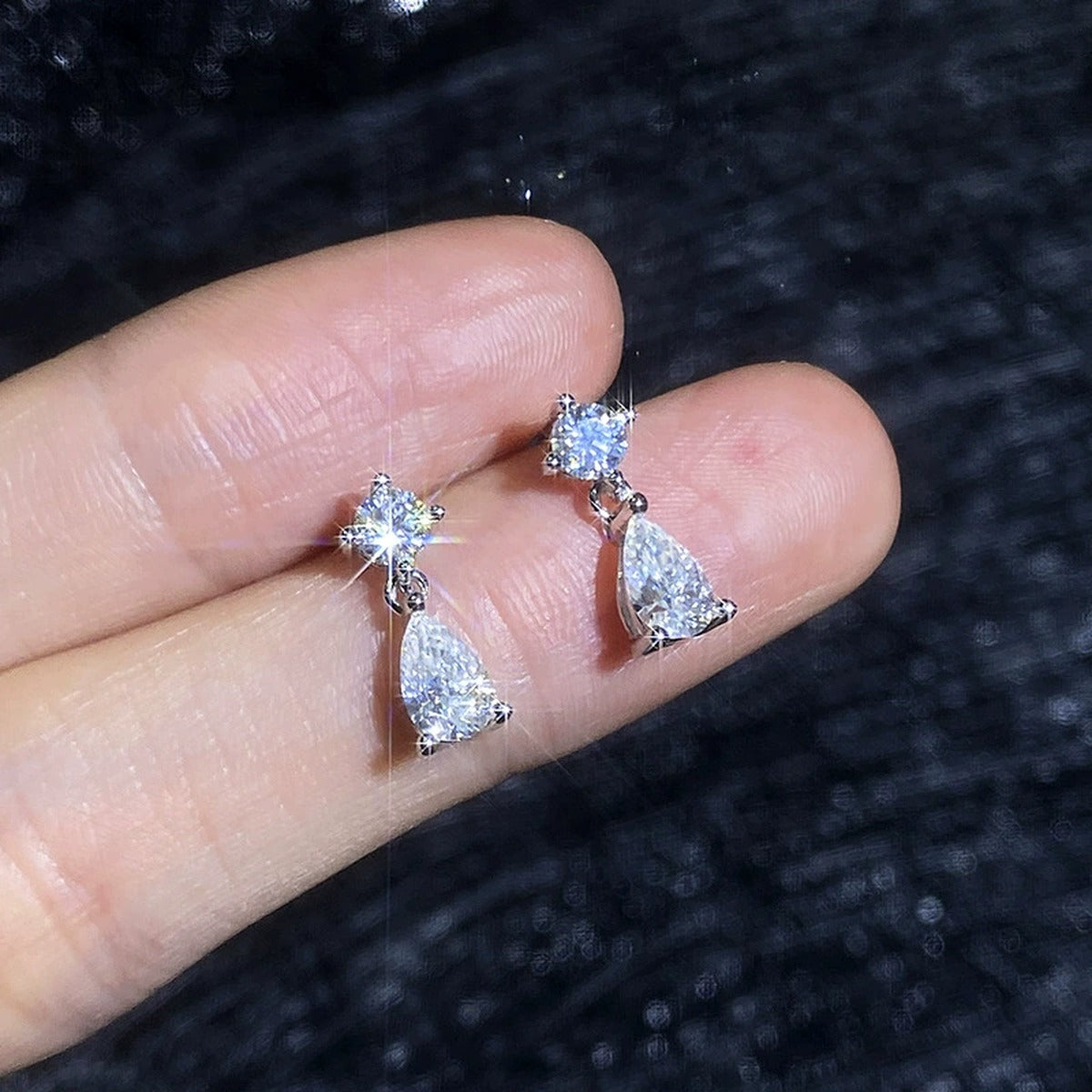Pear Moissanite Drop Earrings in White Gold-Plated S925 Sterling Silver close-up product detail view