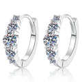Graduated Moissanite Hoop Earrings in White Gold-Plated S925 Silver on clean white background showing the pair and graduated hoop earrings with round moissanite stones from 1.9mm to 4mm