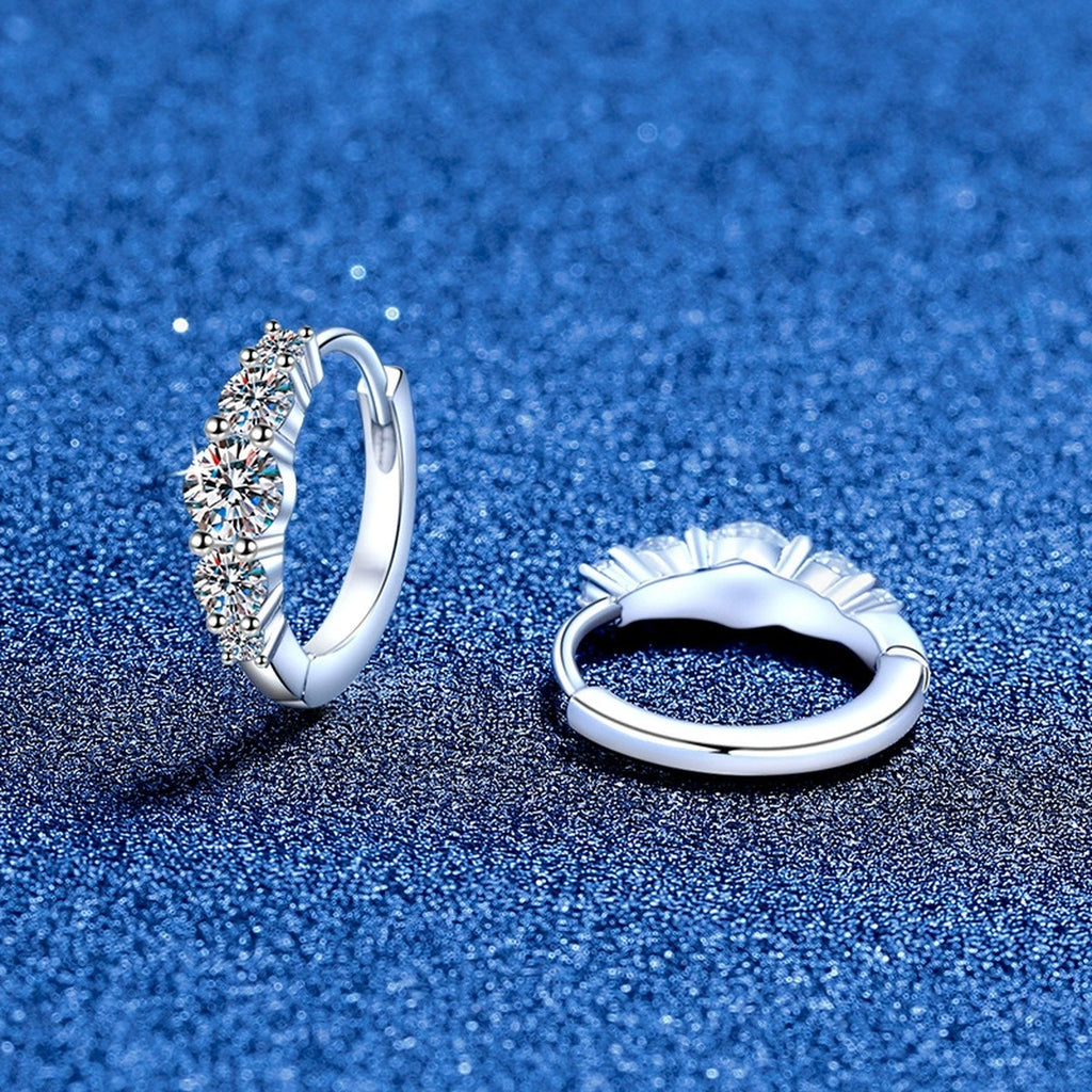 Graduated Moissanite Hoop Earrings in White Gold-Plated S925 Silver blue scene angled view