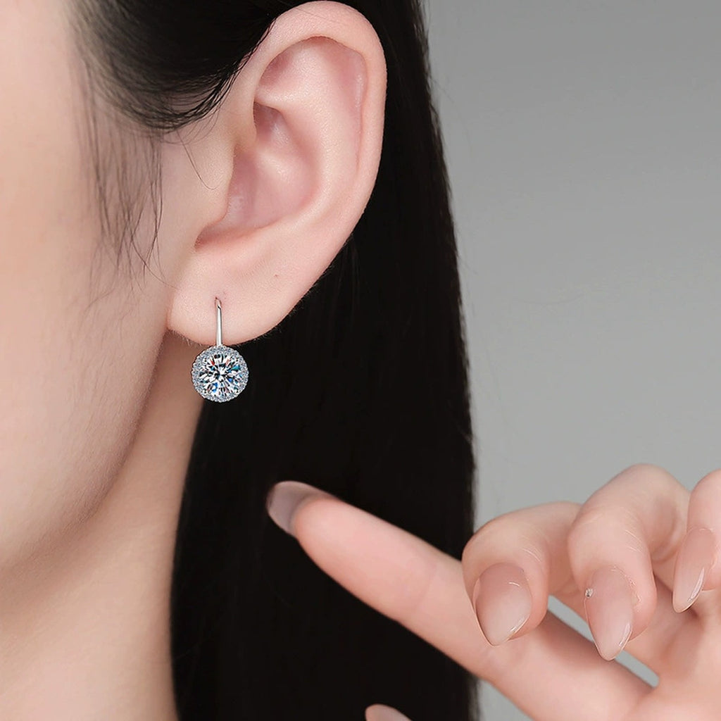 Round Moissanite Leverback Earrings with CZ in White Gold-Plated S925 Sterling Silver worn on ear by model