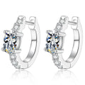 Round Moissanite Huggie Hoop Earrings with CZ in White Gold-Plated S925 Sterling Silver on clean white background showing a white gold huggie hoop with a round moissanite front and CZ accents