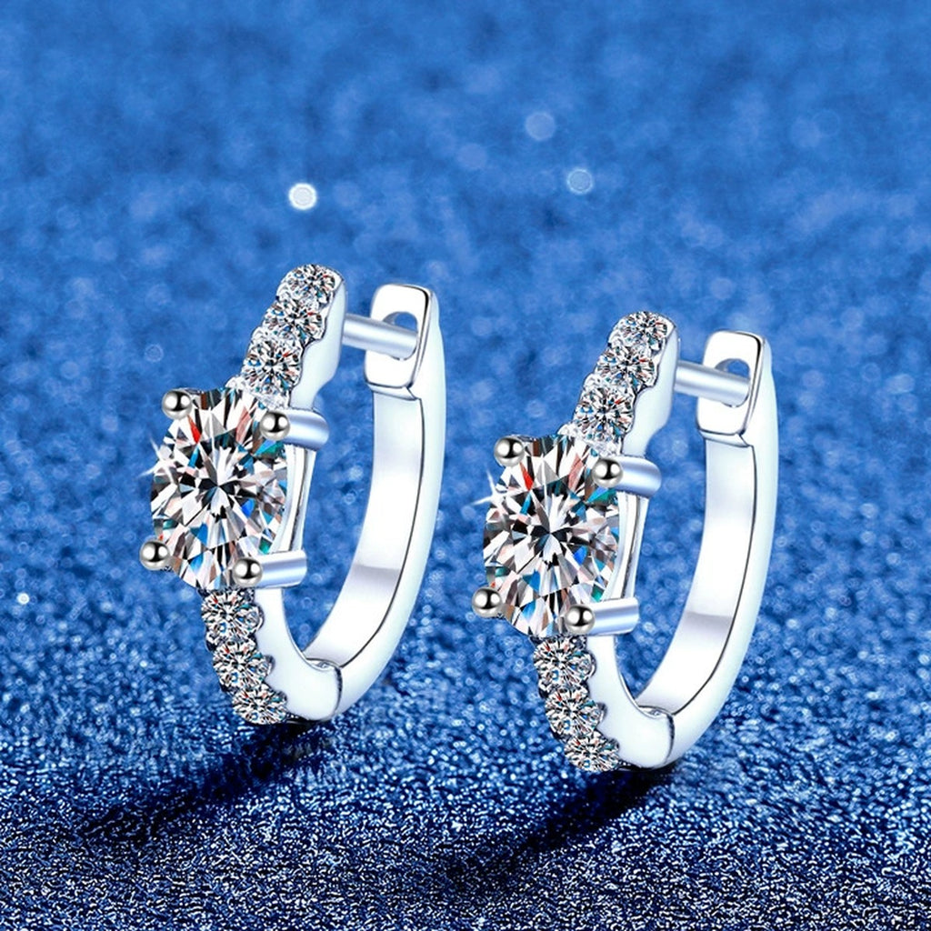 Round Moissanite Huggie Hoop Earrings with CZ in White Gold-Plated S925 Sterling Silver blue scene angled view