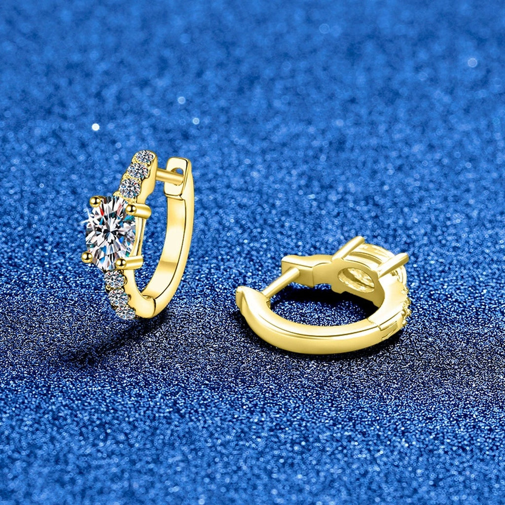 Round Moissanite Huggie Hoop Earrings with CZ in White Gold-Plated S925 Sterling Silver blue scene close-up view