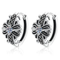 Floral Moissanite Hoop Earrings with CZ in White Gold-Plated S925 Sterling Silver on clean white background showing a floral hoop design with a small moissanite center and dark accent details