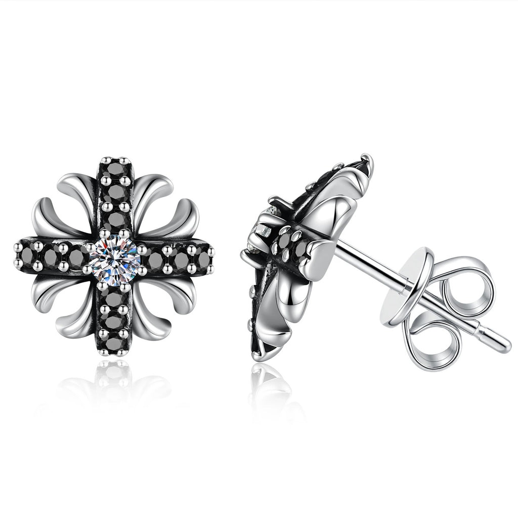 Cross Flower Moissanite Stud Earrings with CZ in White Gold-Plated S925 Sterling Silver on clean white background showing a cross-flower stud with a small round moissanite center and dark CZ accents