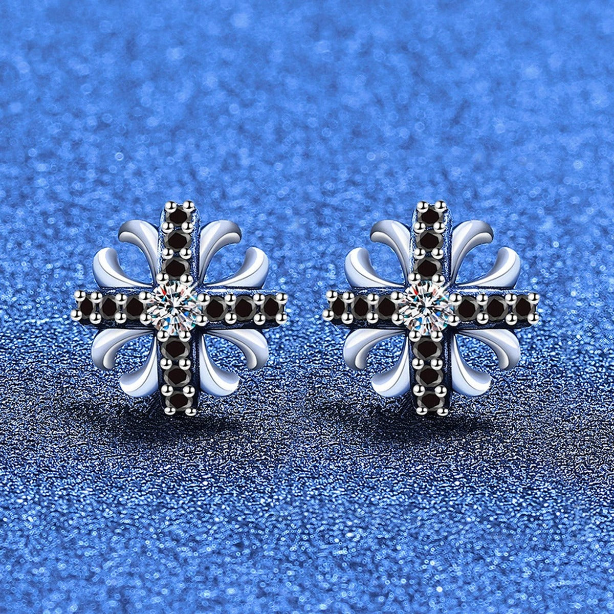 Cross Flower Moissanite Stud Earrings with CZ in White Gold-Plated S925 Sterling Silver blue scene angled view