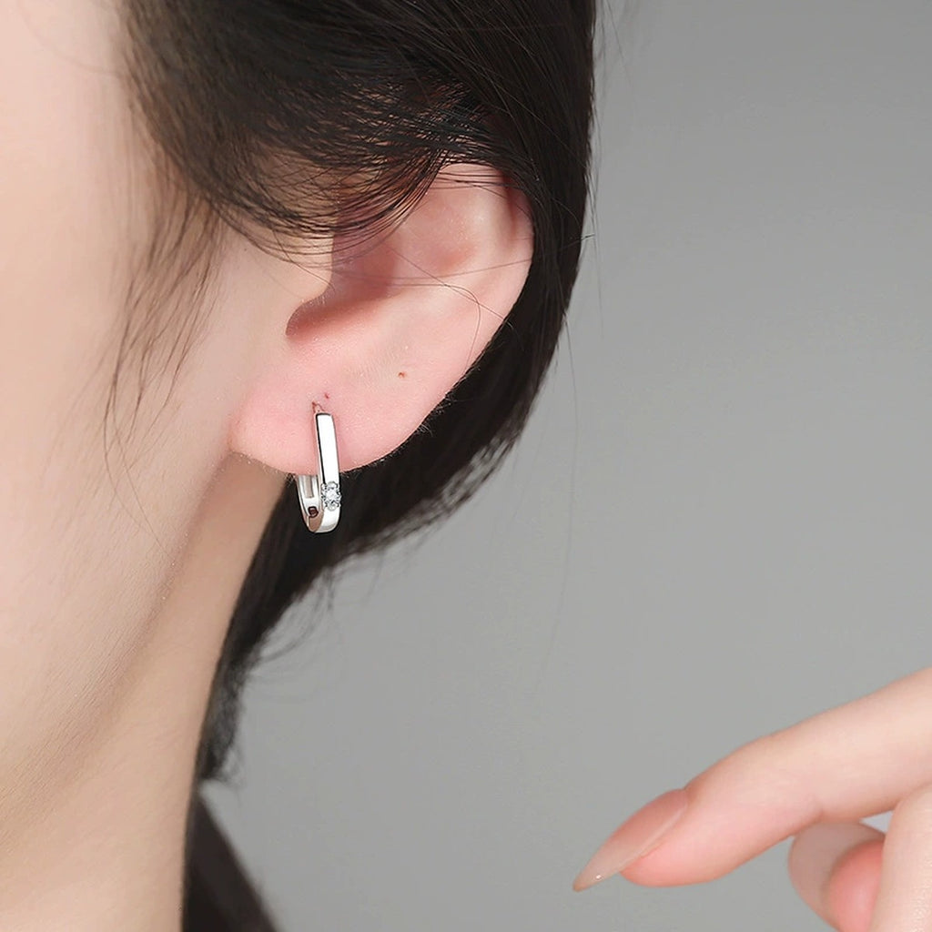 Slim Rectangle Moissanite Hoop Earrings in White Gold-Plated S925 Sterling Silver worn on ear by model