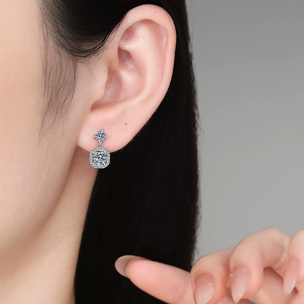 Cushion Halo Moissanite Drop Earrings with CZ in White Gold-Plated S925 Sterling Silver worn on ear by model