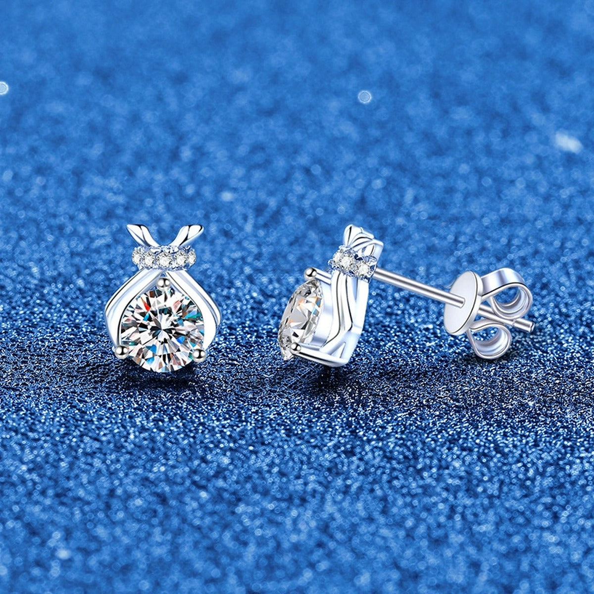 Pear-Shaped Bow Moissanite Stud Earrings in White Gold-Plated S925 Sterling Silver with CZ blue scene product view