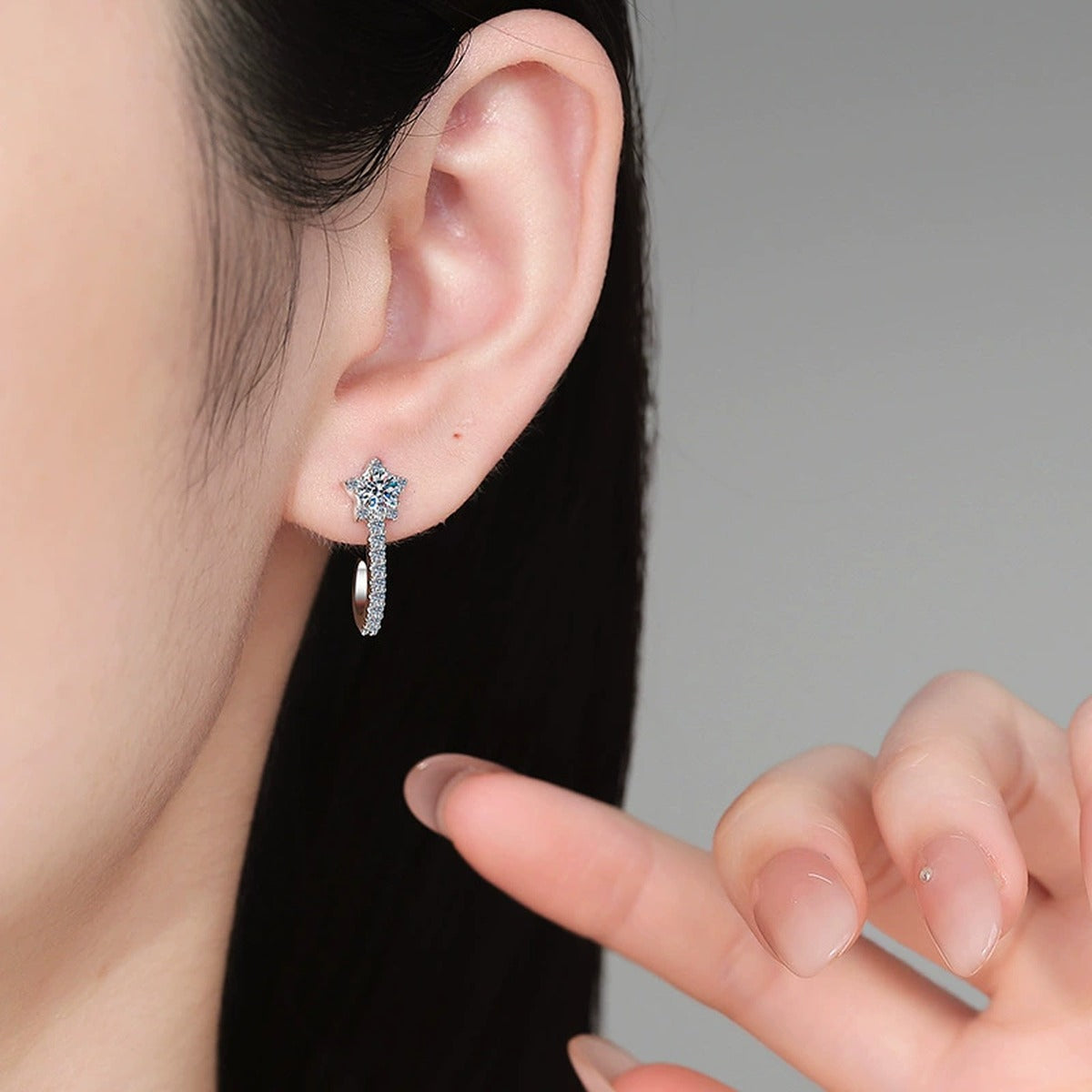 Star Drop Earrings in Gold-Plated S925 Sterling Silver with Moissanite and CZ worn on ear by model