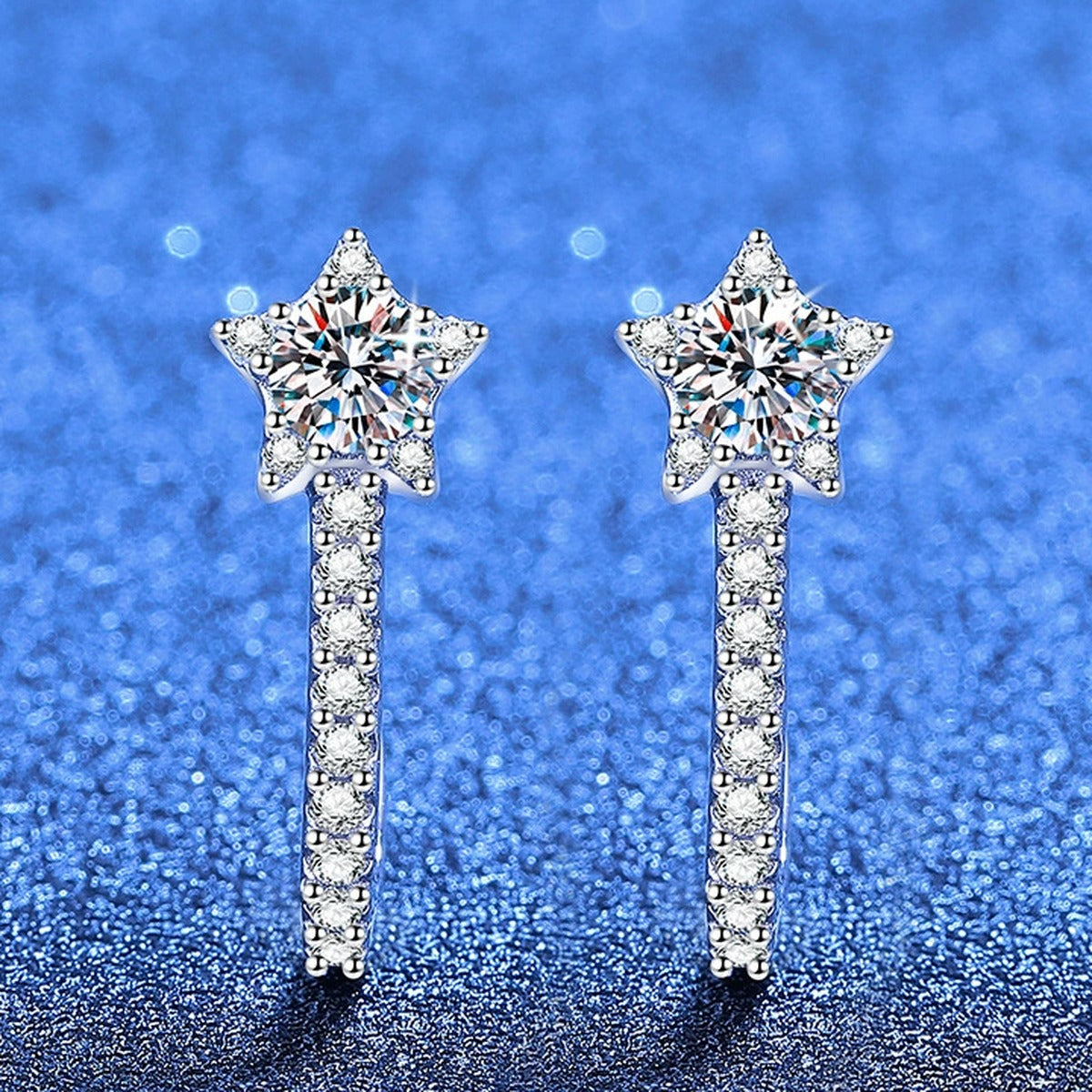 Star Drop Earrings in Gold-Plated S925 Sterling Silver with Moissanite and CZ blue scene close-up view