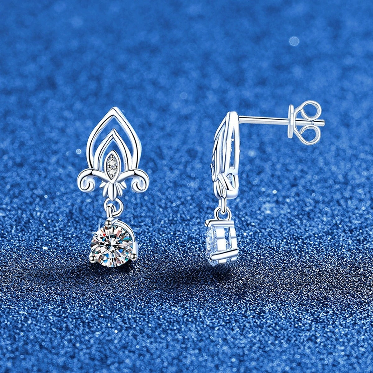 Fleur-de-Lis Moissanite Drop Earrings in White Gold-Plated S925 Sterling Silver with CZ blue scene angled view