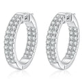 Wide Pave Moissanite Hoop Earrings in White Gold-Plated S925 Sterling Silver on clean white background showing a wide pave hoop silhouette