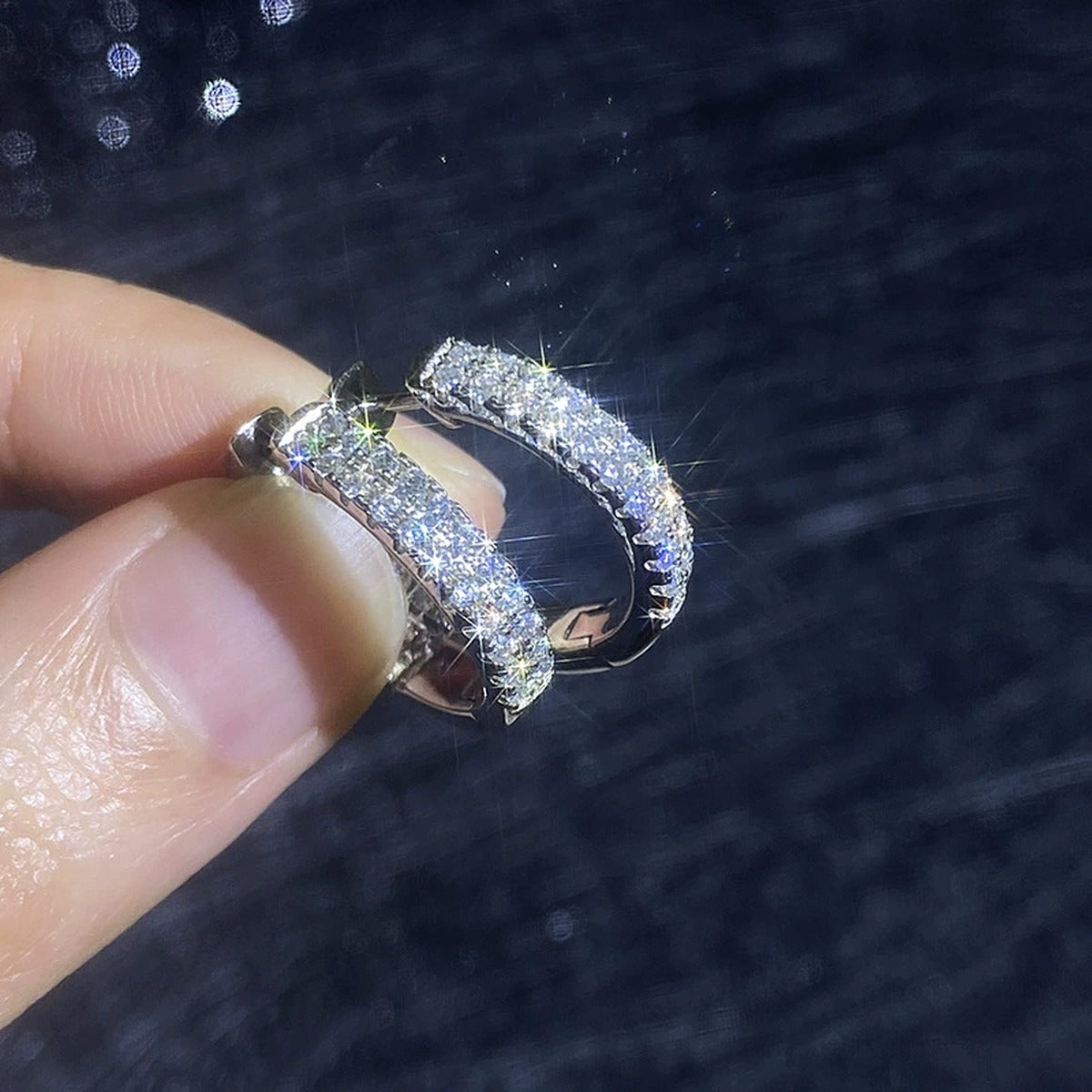 Wide Pave Moissanite Hoop Earrings in White Gold-Plated S925 Sterling Silver close-up product detail view