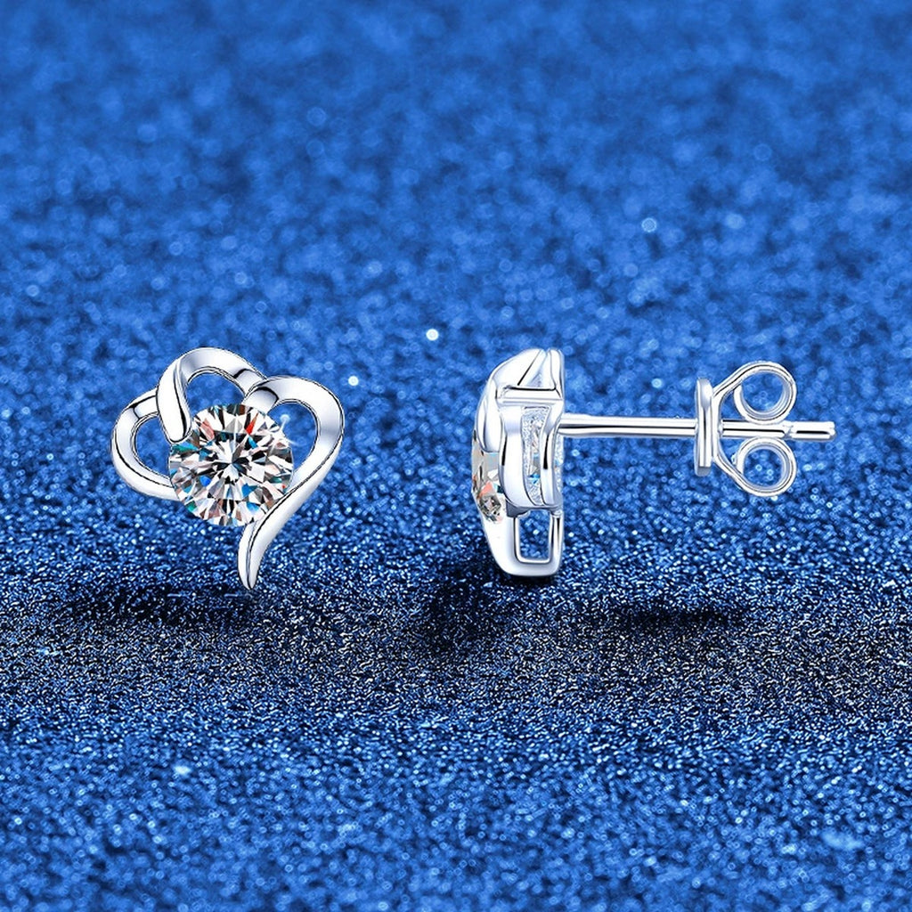 Open Heart Moissanite Stud Earrings in White Gold-Plated S925 Sterling Silver blue scene angled view