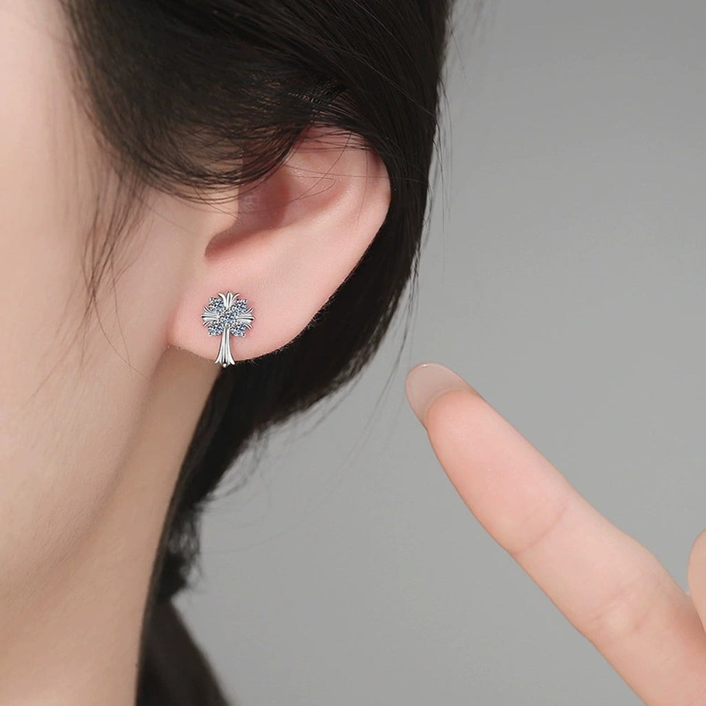Palm Cross Moissanite Stud Earrings in White Gold-Plated S925 Sterling Silver worn on ear by model