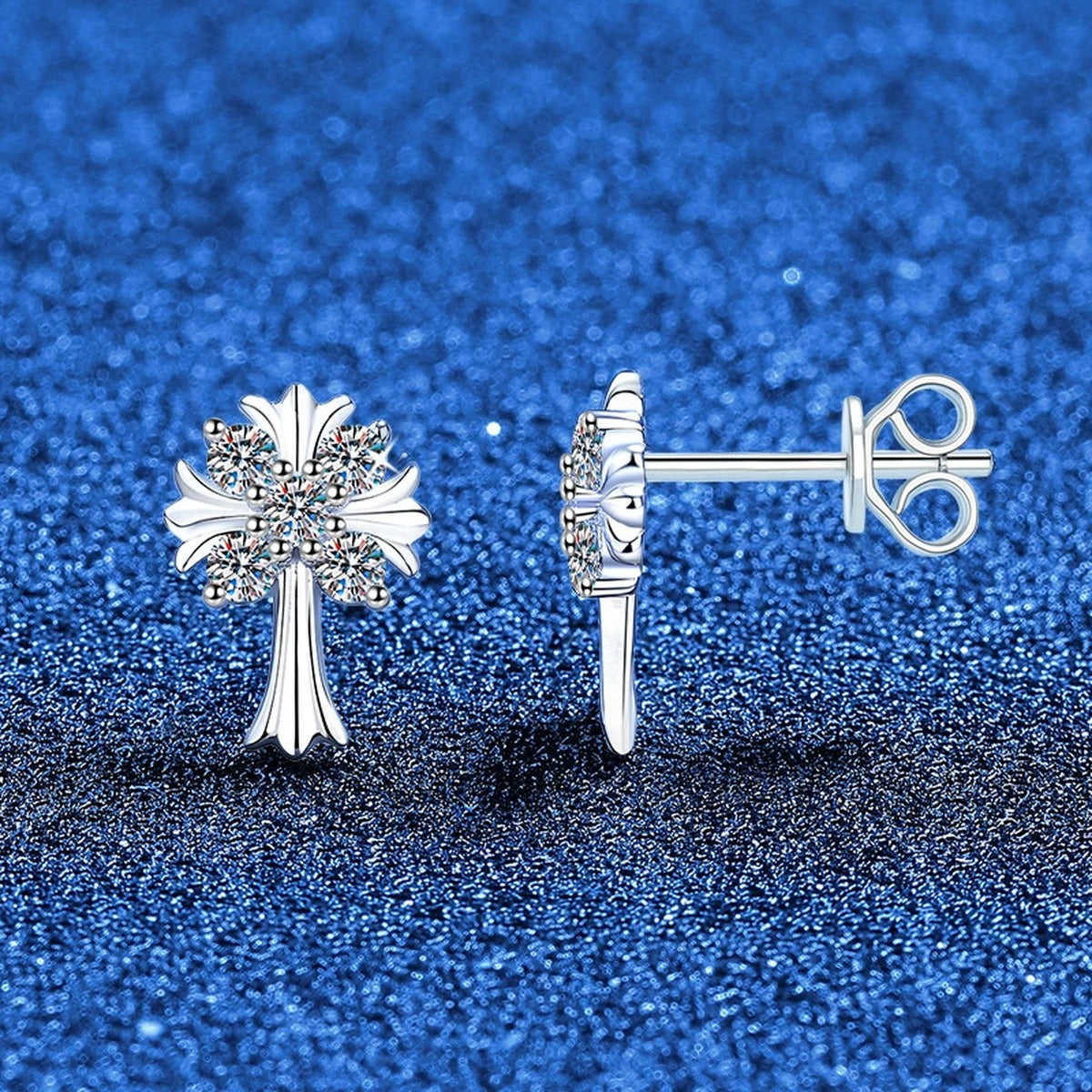 Palm Cross Moissanite Stud Earrings in White Gold-Plated S925 Sterling Silver blue scene angled view